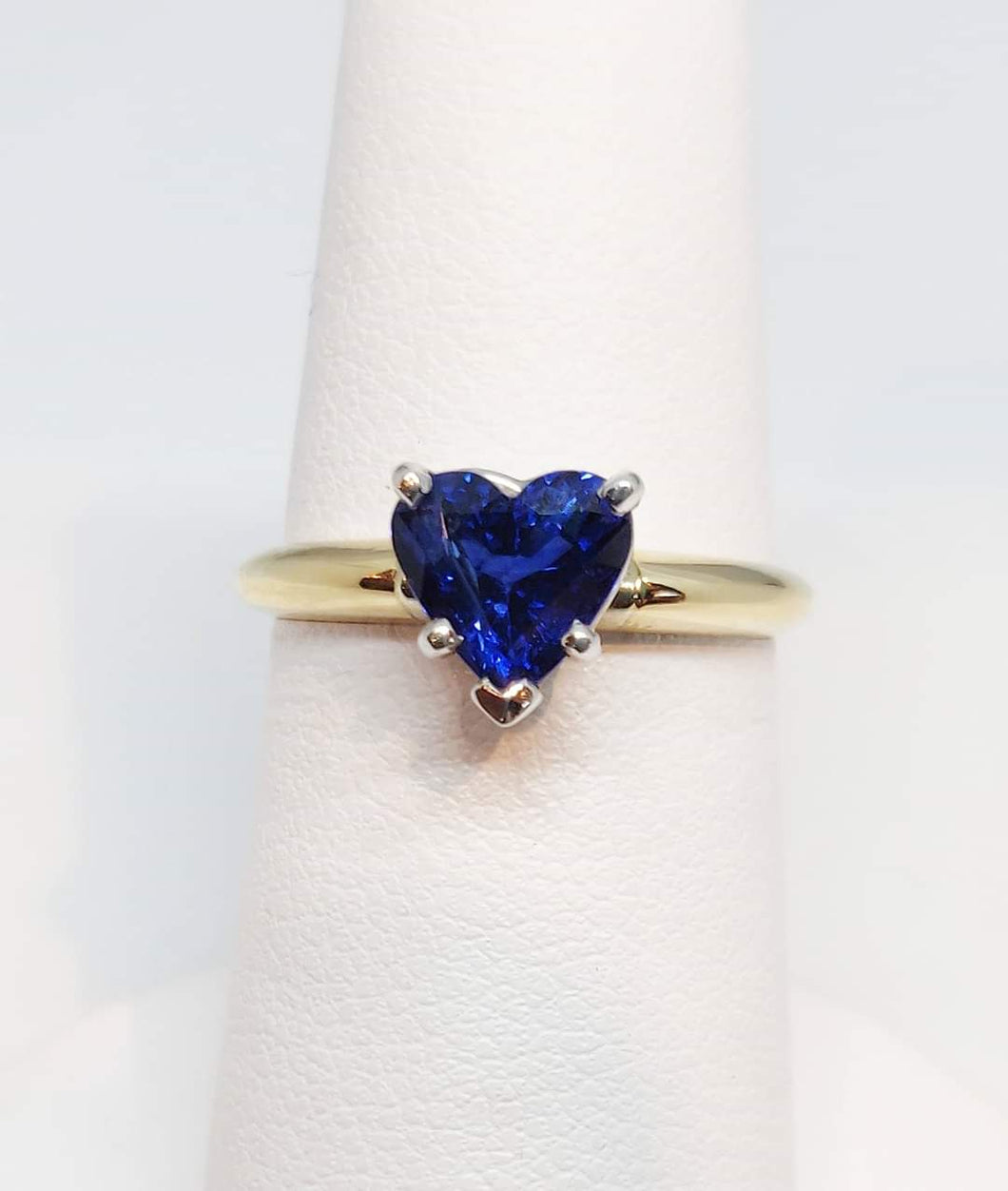 Blue topaz heart shaped solitaire ring